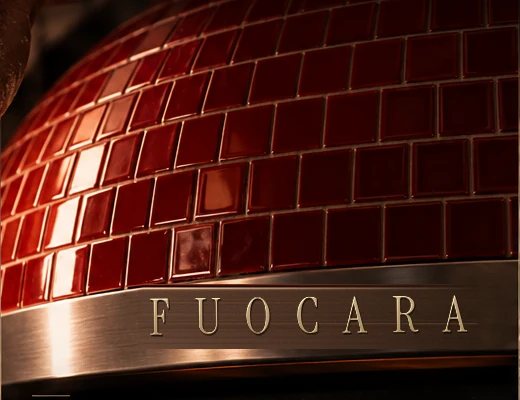 Close-up of the red glazed ceramic tiles and the stainless FUOCARA band