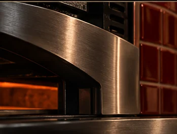 Brushed stainless steel detail of the oven arch